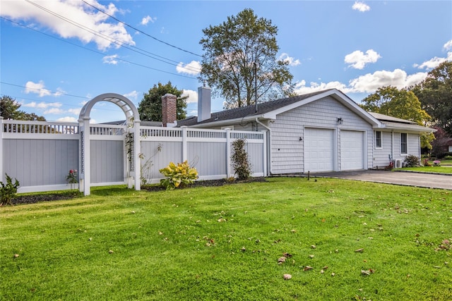 view of yard featuring a garage