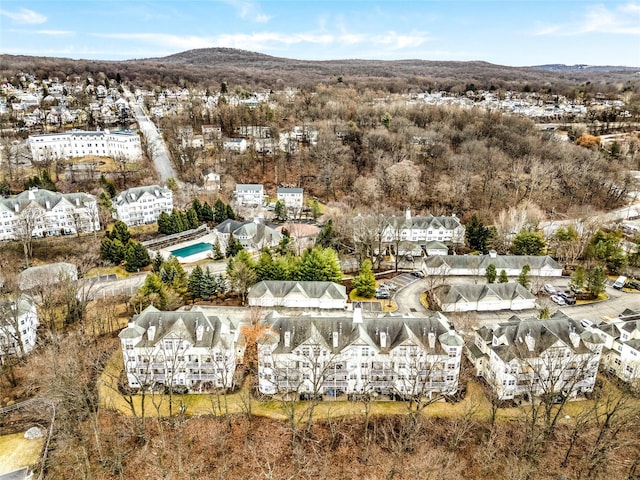 birds eye view of property featuring a mountain view