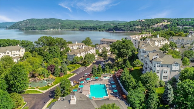 bird's eye view featuring a water and mountain view