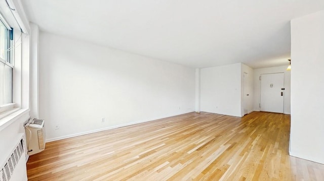 empty room featuring light wood-style flooring