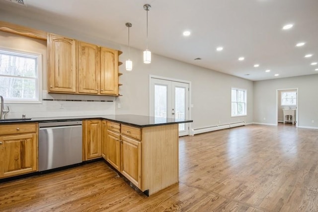 kitchen featuring hanging light fixtures, baseboard heating, tasteful backsplash, stainless steel dishwasher, and kitchen peninsula