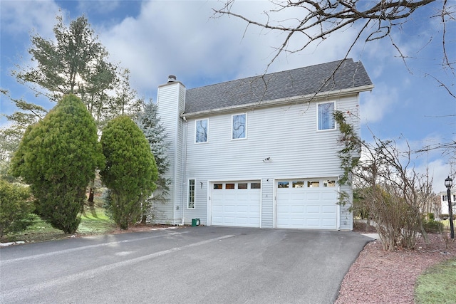 view of home's exterior with a garage