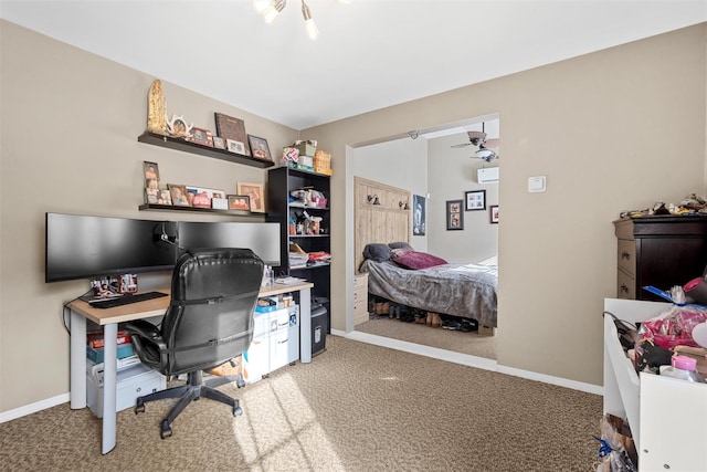 home office with ceiling fan and carpet flooring