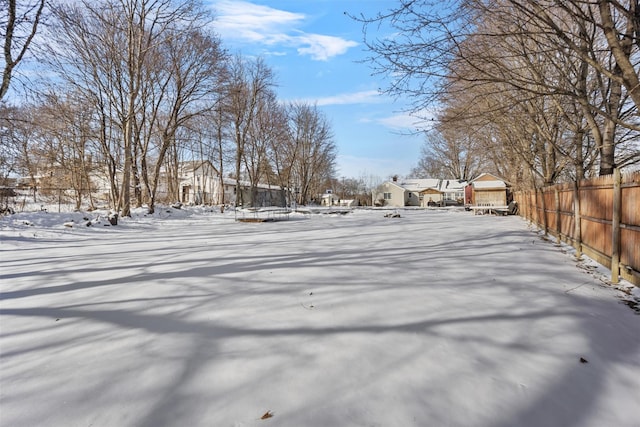 view of yard layered in snow