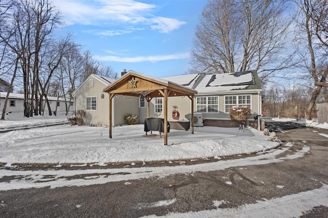 view of snow covered property