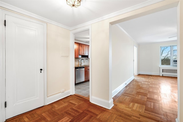 hall featuring sink, crown molding, parquet floors, and radiator