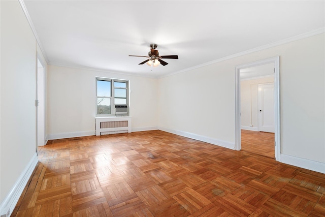 spare room featuring parquet flooring, crown molding, radiator, ceiling fan, and cooling unit