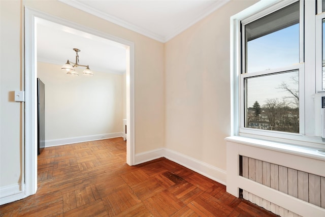 hall with an inviting chandelier, crown molding, dark parquet floors, and radiator