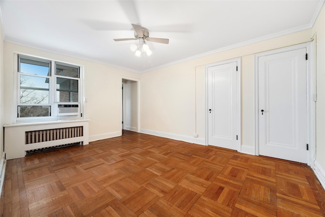 unfurnished bedroom featuring radiator heating unit, parquet floors, ceiling fan, and multiple closets