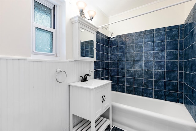 bathroom featuring vanity and tiled shower / bath combo