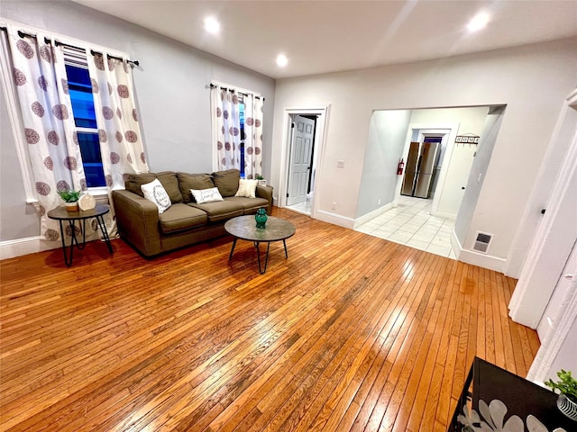 living room featuring light wood-type flooring