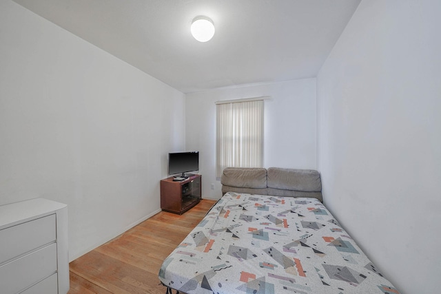 bedroom with light hardwood / wood-style flooring