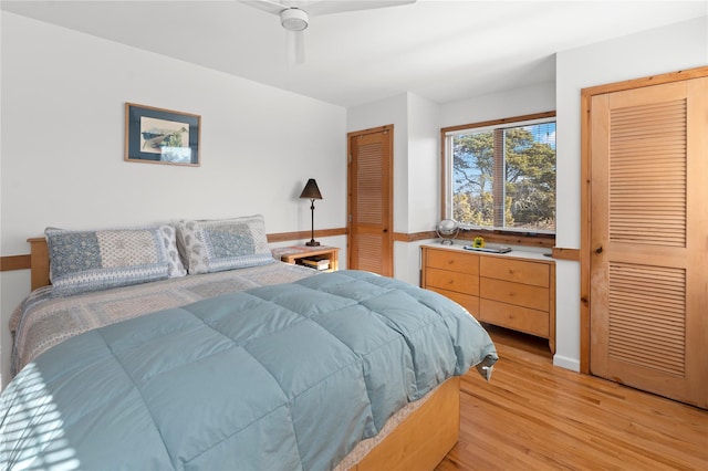 bedroom with ceiling fan and light hardwood / wood-style flooring