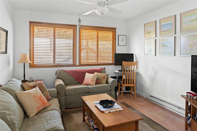 tiled living room featuring ceiling fan and a baseboard radiator