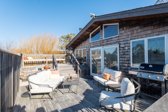 wooden deck with outdoor lounge area