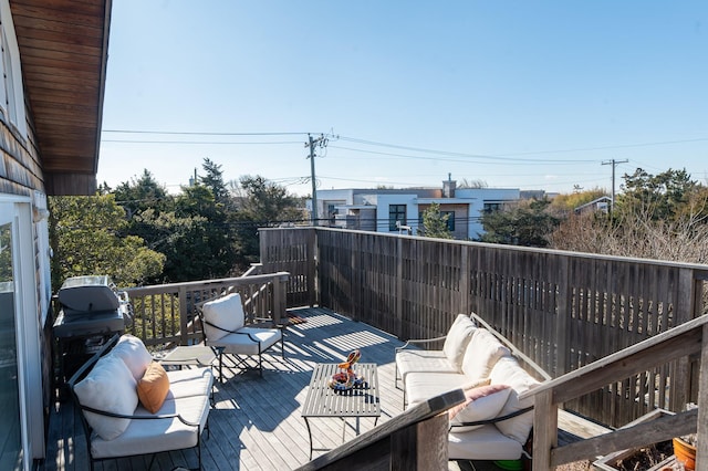 deck with an outdoor hangout area