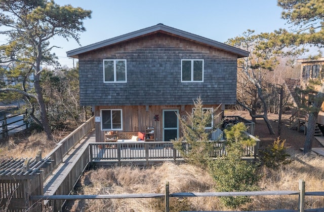 rear view of house with a deck