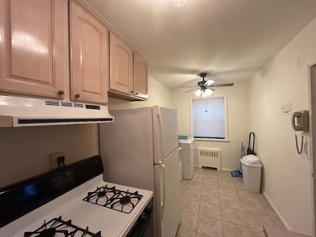 kitchen with white appliances, radiator, ceiling fan, light tile patterned floors, and light brown cabinetry