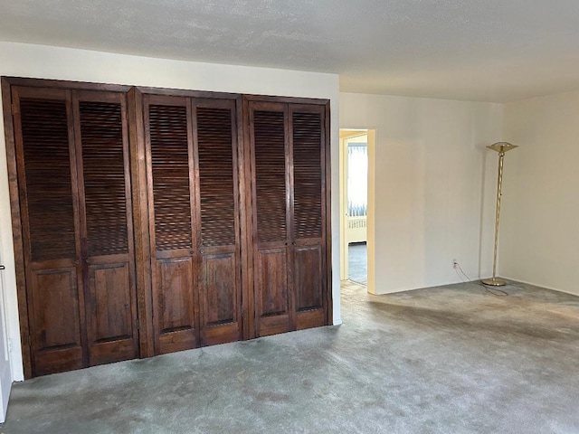 unfurnished bedroom featuring carpet flooring