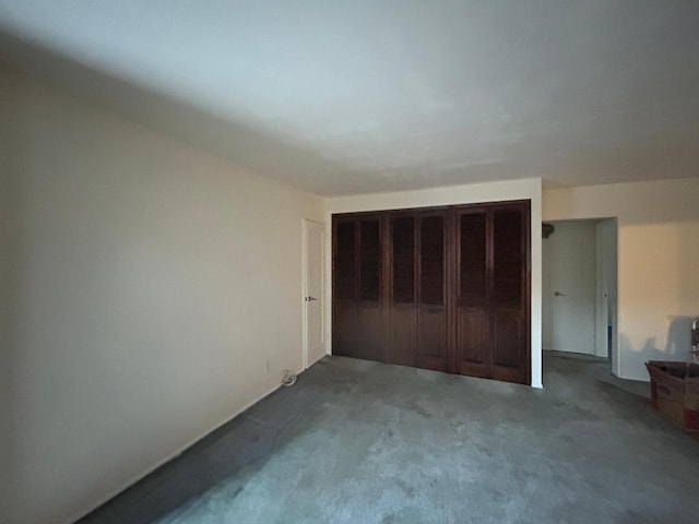 unfurnished bedroom featuring carpet