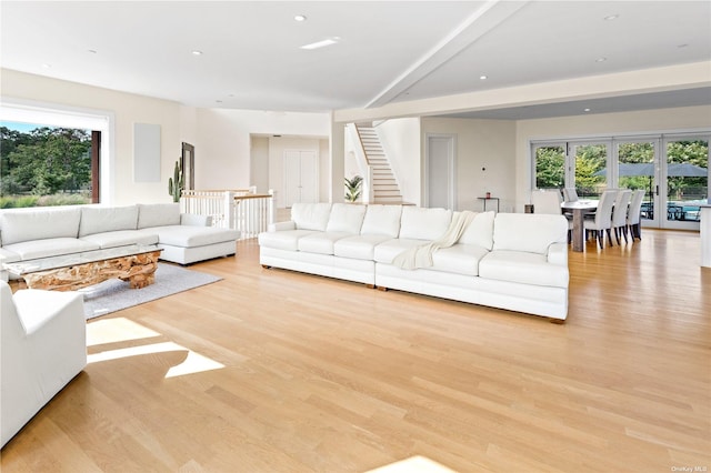 living room with light hardwood / wood-style flooring