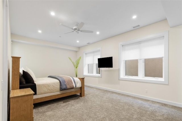 carpeted bedroom featuring ceiling fan