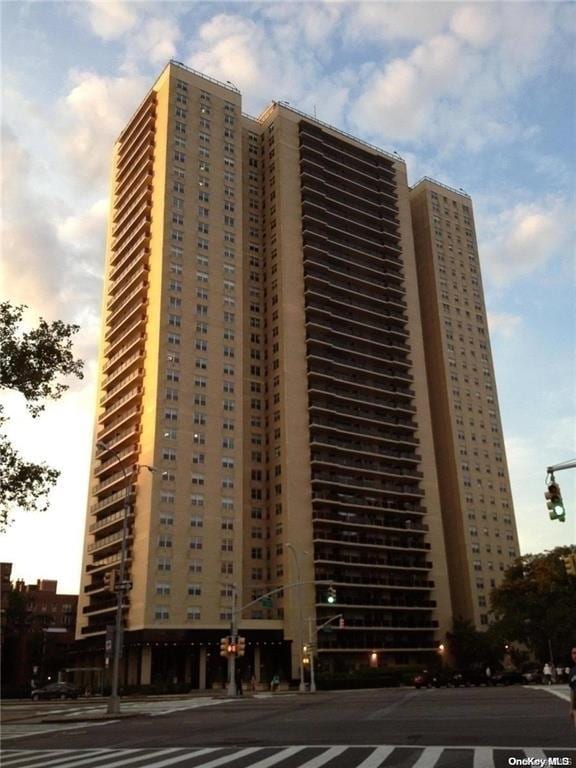 view of outdoor building at dusk