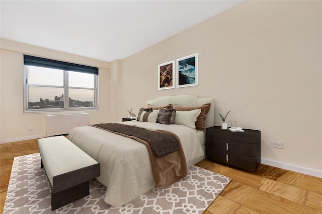 bedroom featuring hardwood / wood-style floors