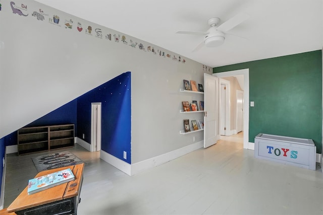 interior space featuring ceiling fan