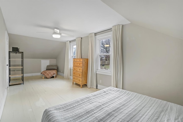 bedroom with vaulted ceiling and ceiling fan