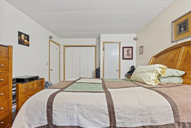 bedroom featuring a textured ceiling