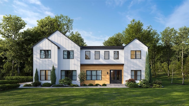 modern inspired farmhouse with a front yard and french doors