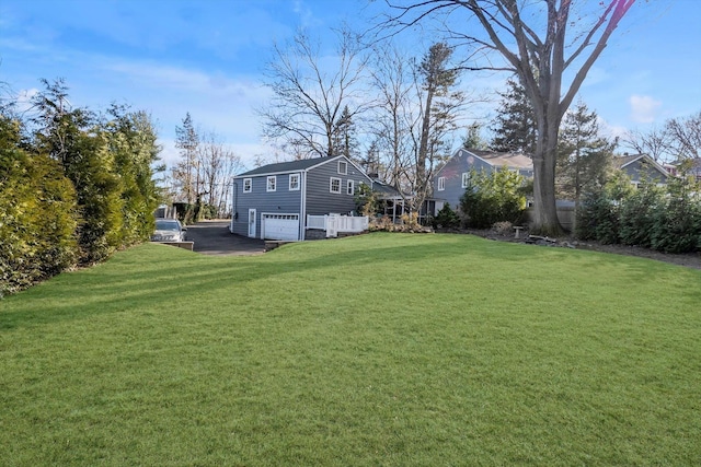 view of yard with a garage