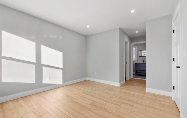 unfurnished room with plenty of natural light and light wood-type flooring