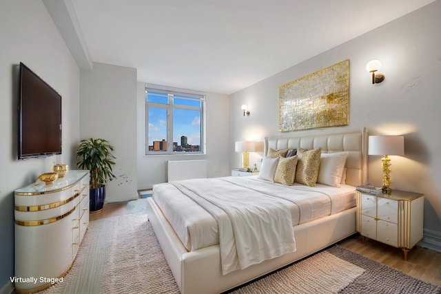 bedroom featuring light wood-type flooring