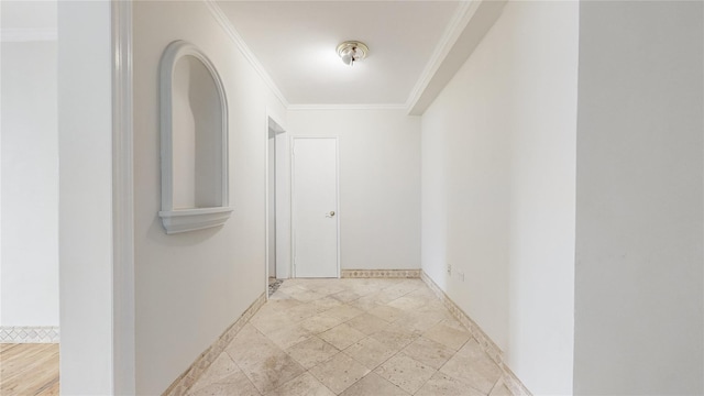 hallway featuring ornamental molding