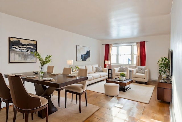 living room with light hardwood / wood-style flooring