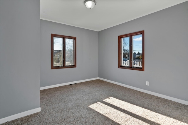 view of carpeted spare room