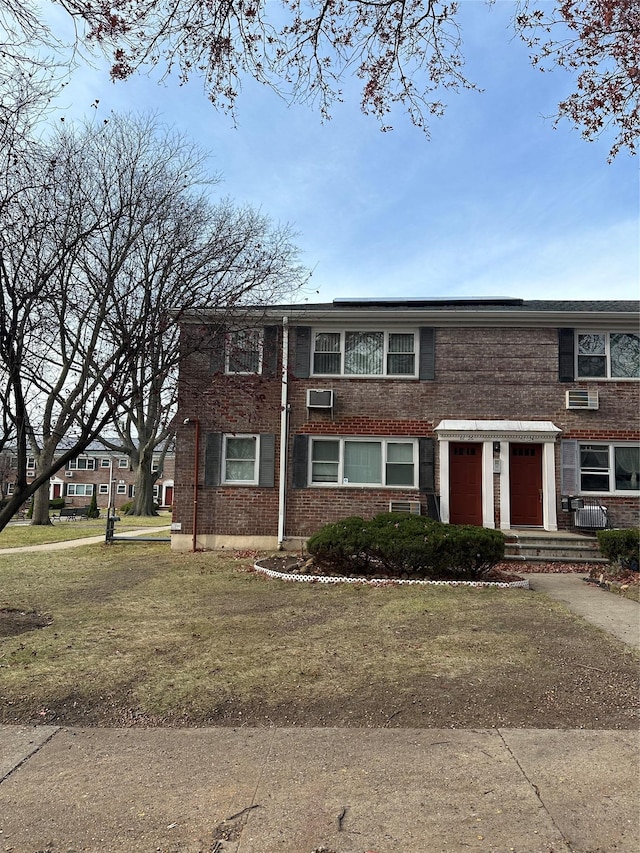 view of front of home with a front lawn