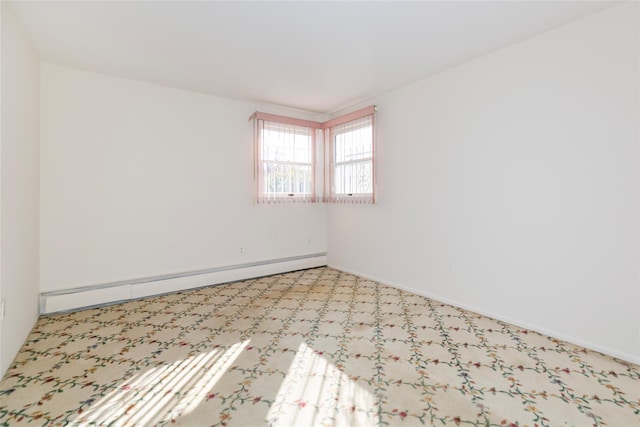 empty room featuring baseboard heating