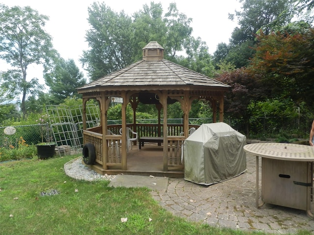 view of patio / terrace featuring a gazebo and a grill