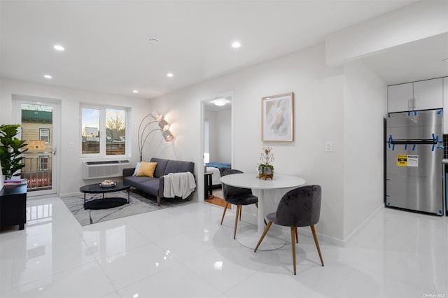 tiled living room featuring a wall mounted air conditioner