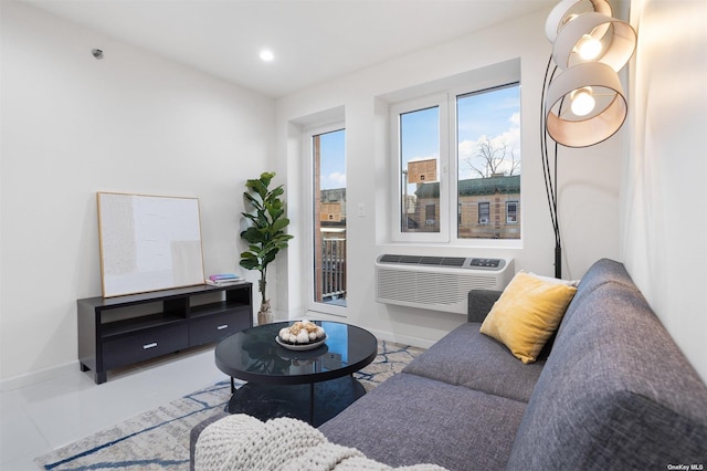 living room featuring a wall unit AC