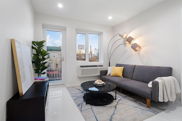 tiled living room featuring an AC wall unit