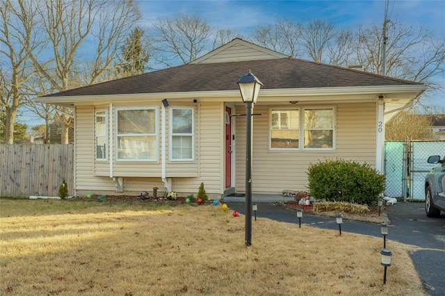 view of front of property with a front lawn