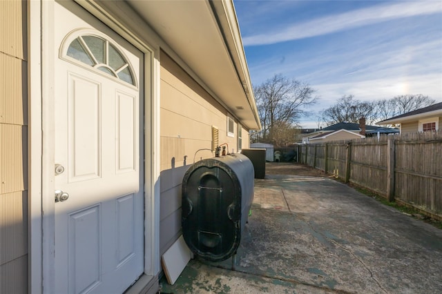 view of side of property featuring a patio