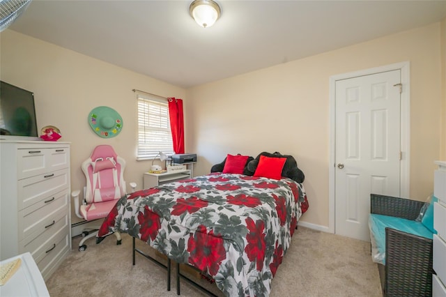 bedroom with light carpet