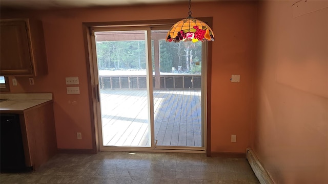 unfurnished dining area featuring a baseboard radiator