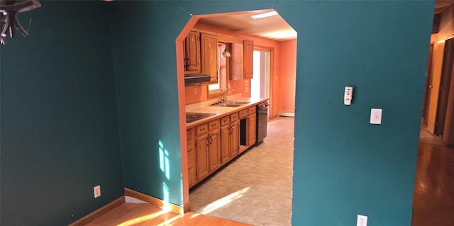 kitchen featuring black appliances and sink