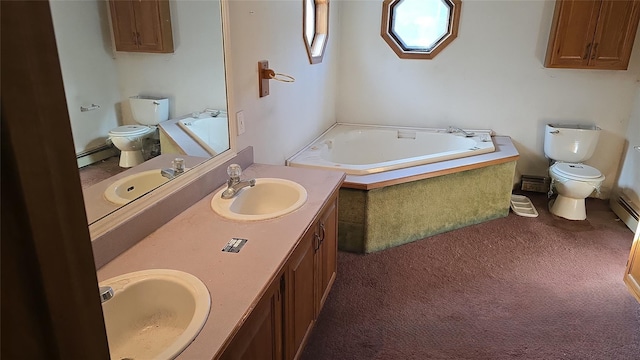 bathroom with toilet, a washtub, vanity, and a baseboard heating unit